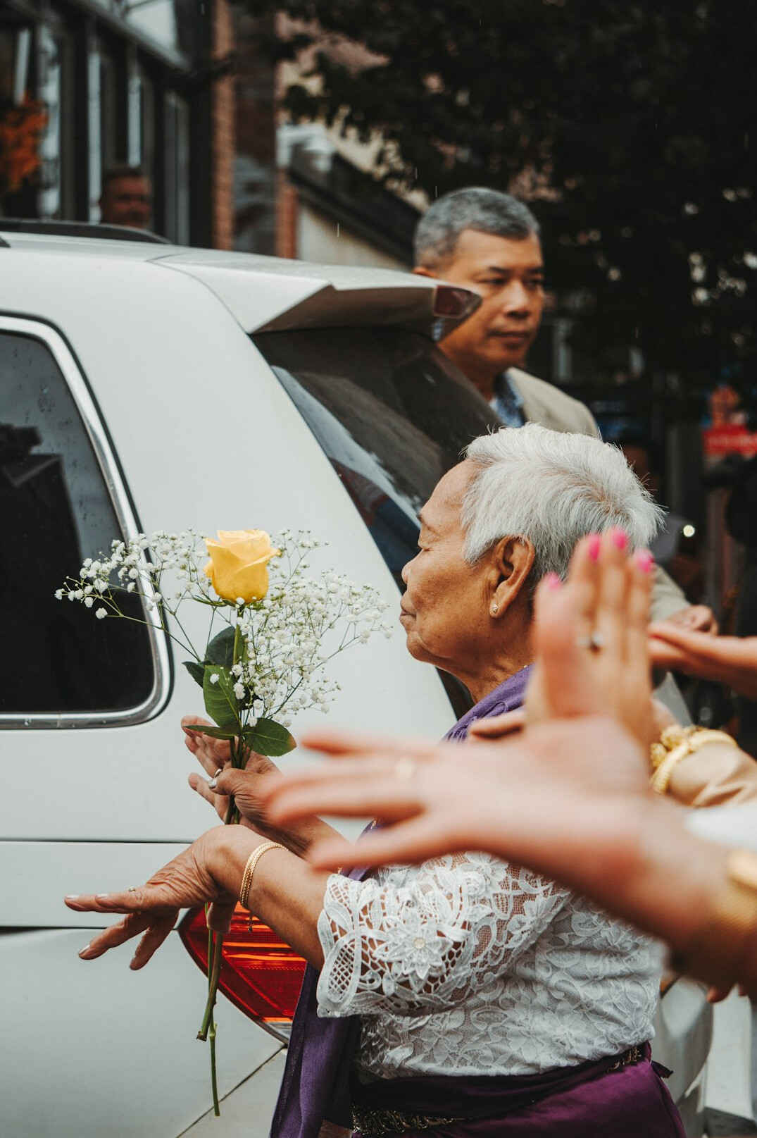 Senior couples dancing together in a community hall