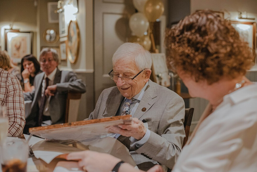 senior man sharing stories