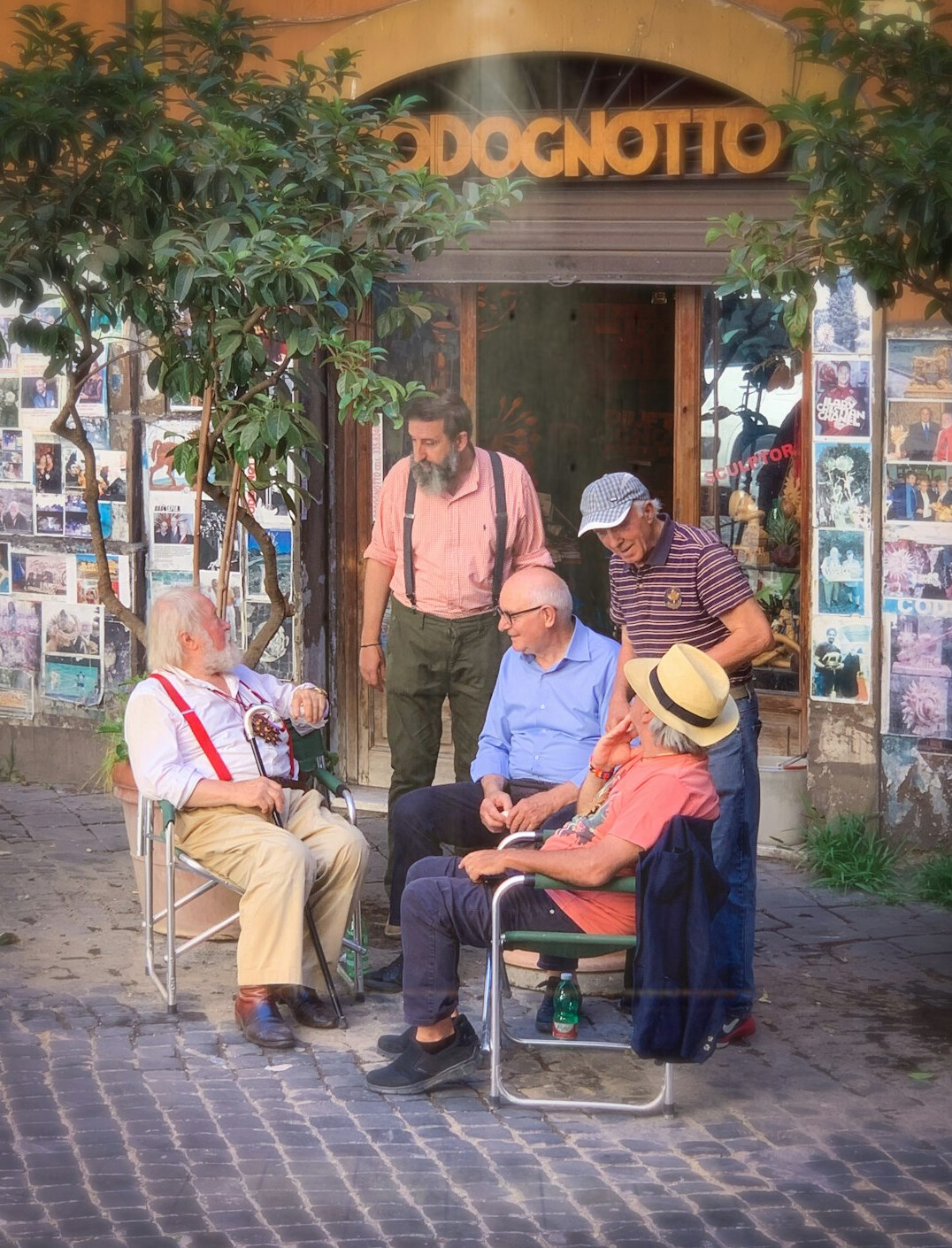 Group of happy senior friends laughing together outdoors