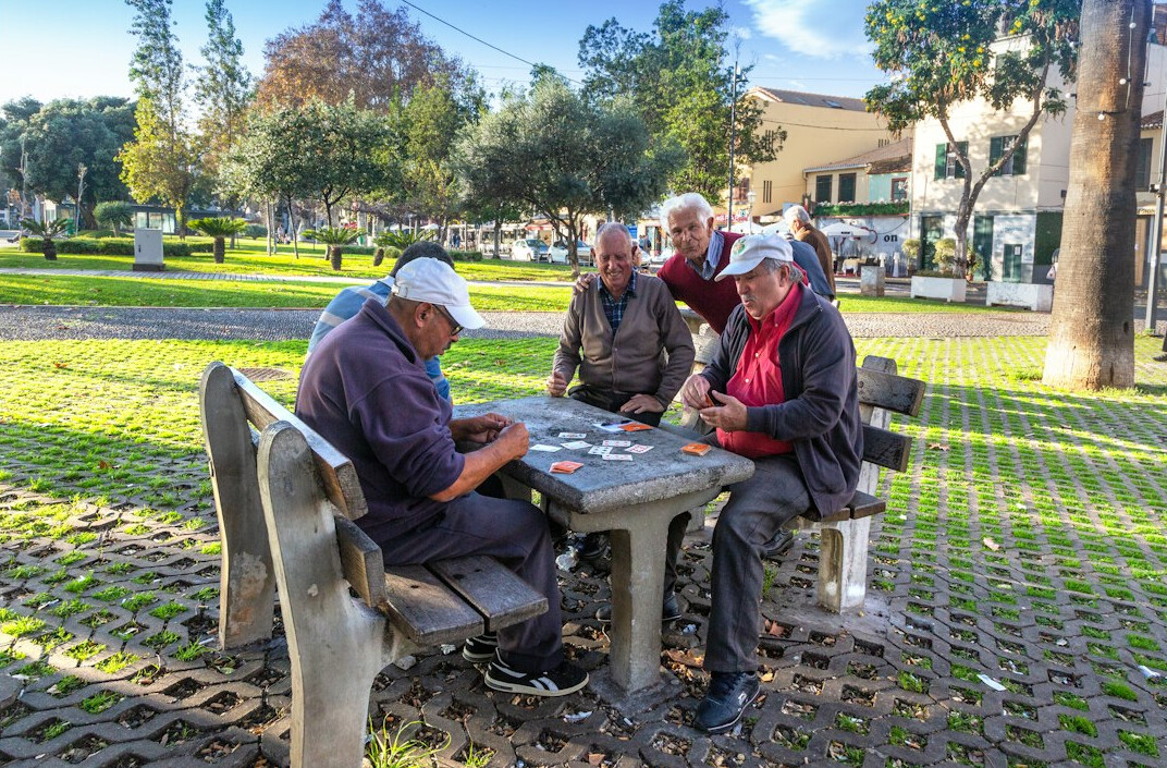 elderly group playing cards